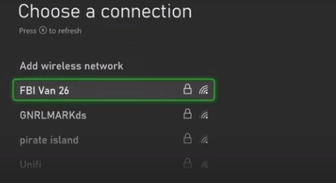 Select your phone's hotspot from the list and enter the password if prompted